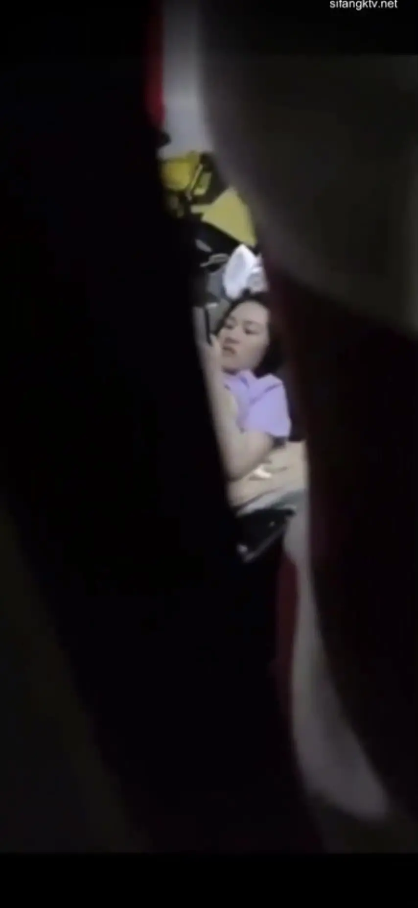 The girl across the street was playing with her cell phone while playing with her B. She finally took a picture of her big fat B and showed it to her boyfriend.